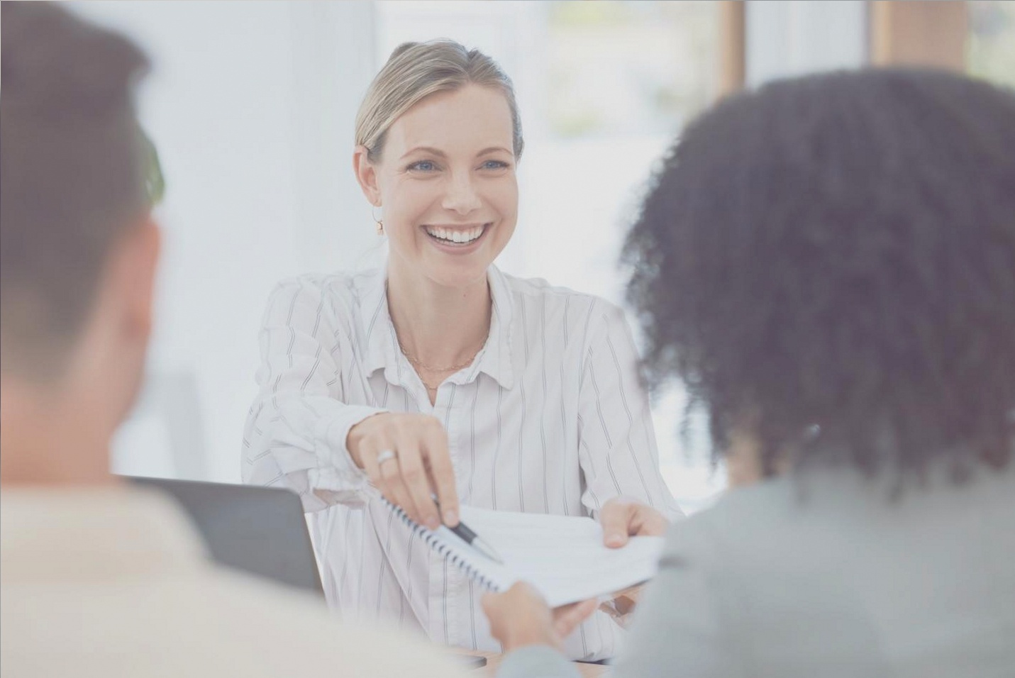 Specialist working with a client in a focused one-on-one session